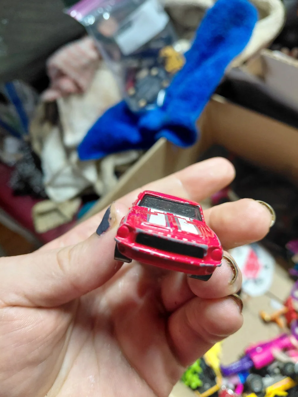 red 1968 Shelby GT500 diecast car by Hot Wheels